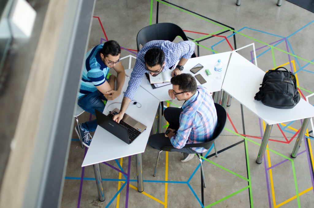 Three mens working together in a project